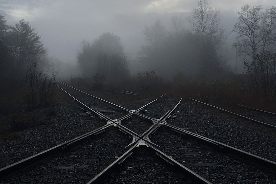 Railroad Crossroad in Fog